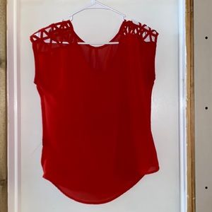 Woman’s Red Blouse